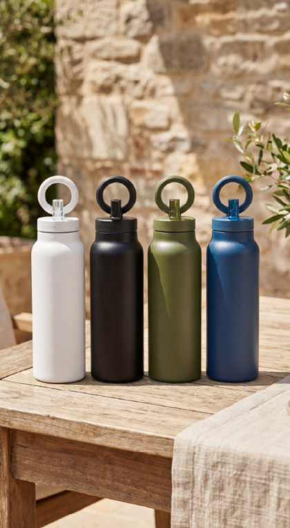 SPL+ bottle in four colour variants on wooden table
